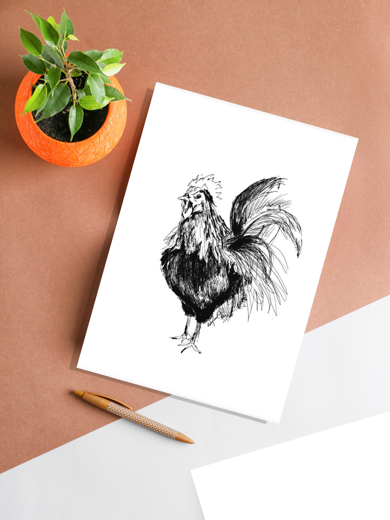 rooster art print hanging on table