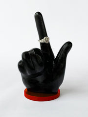 All black ring holder with red base, texas tech guns up hand sign
